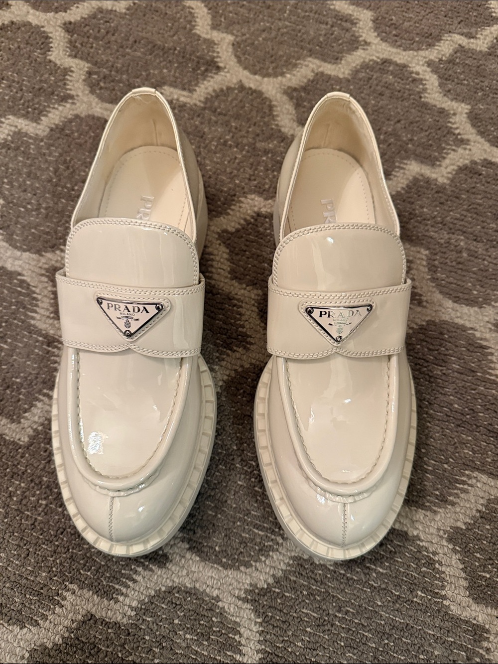 Prada Glossy Ivory Patent Leather Loafers